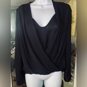Drape front, wrap top. Black.